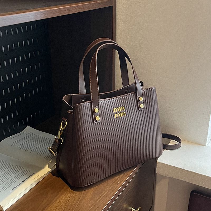 Textured Elegant Handbag with Gold Detailing