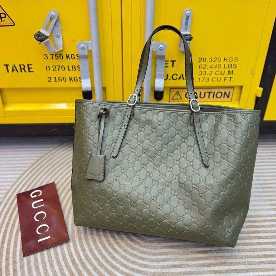 Embossed Monogram Leather Tote Bag