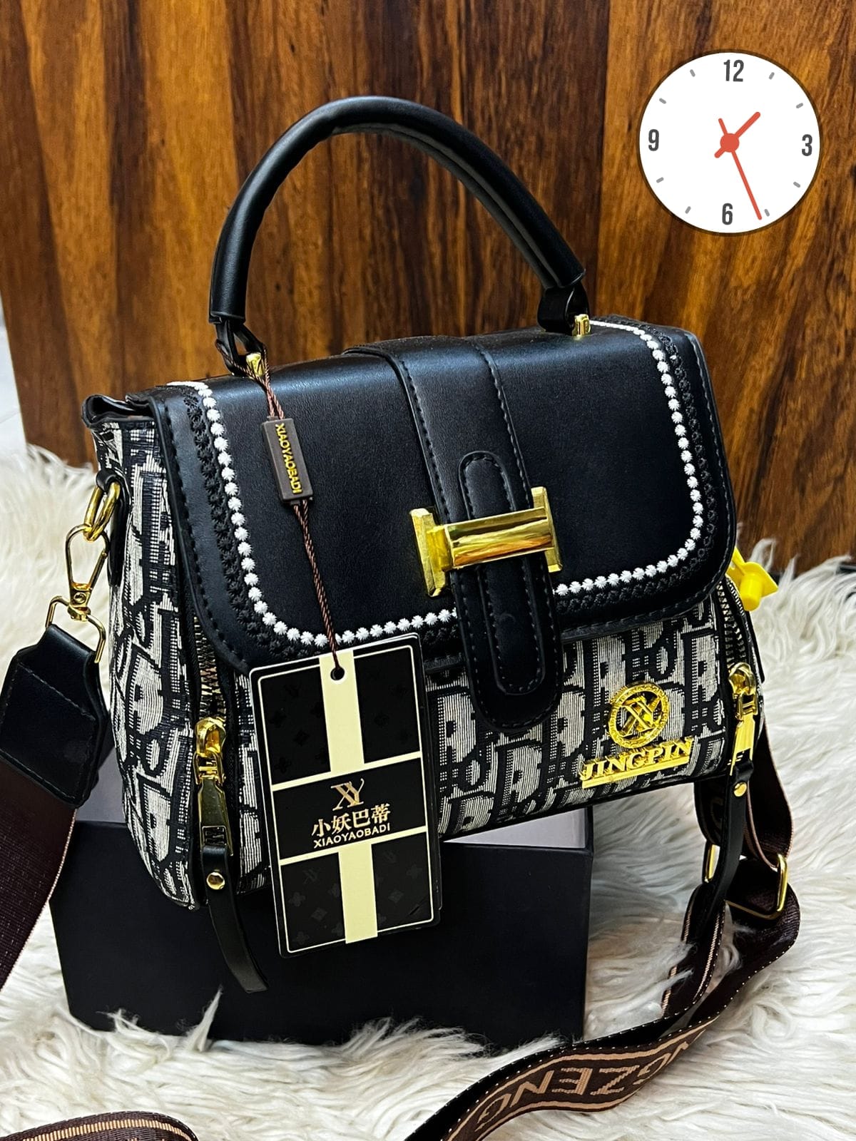 Elegant Two-Tone Structured Satchel with Unique Chain Detail