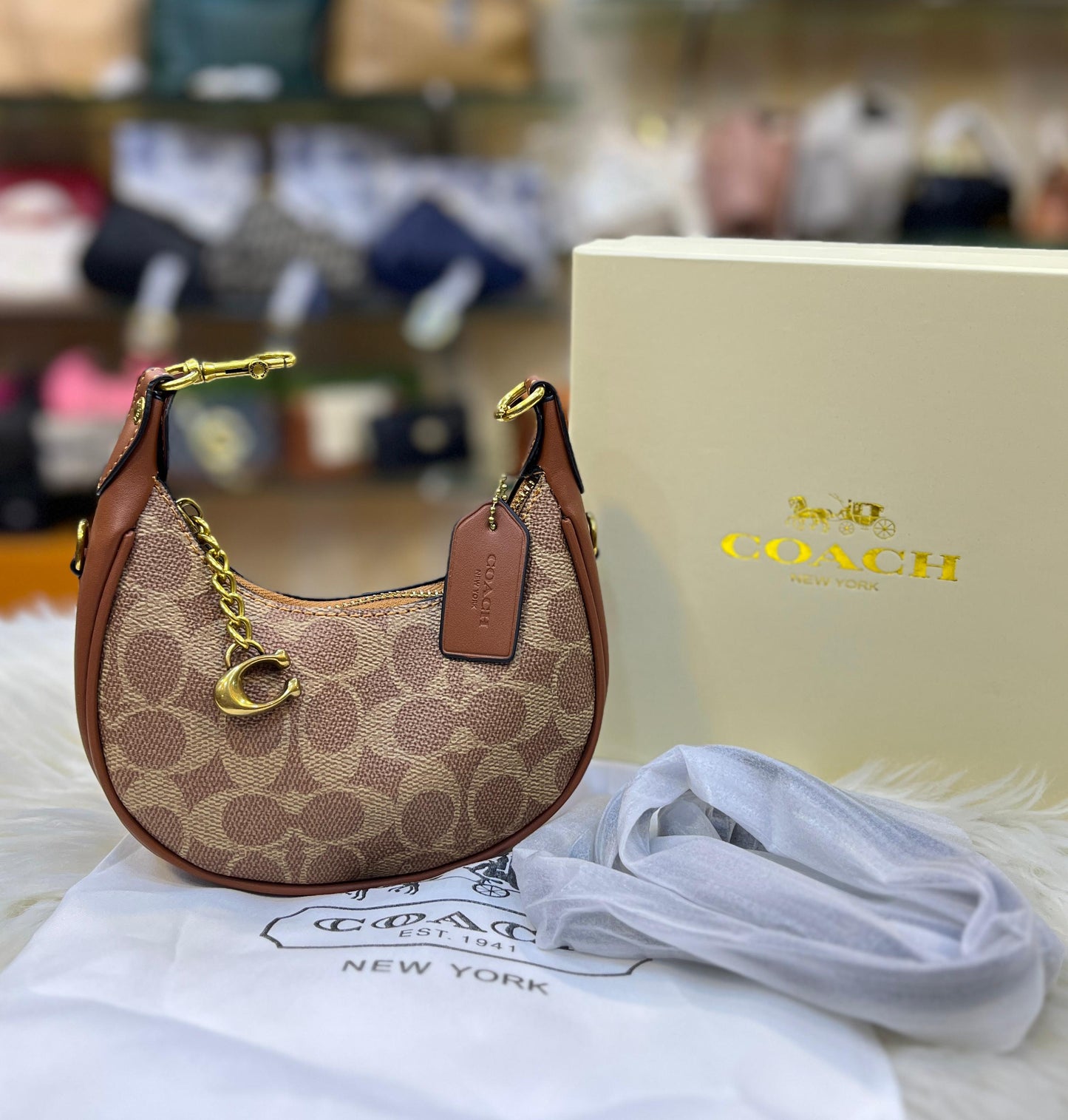 Chic Demi-Lune Mini Shoulder Bag with Gold-Tone Chain and Charm Accent