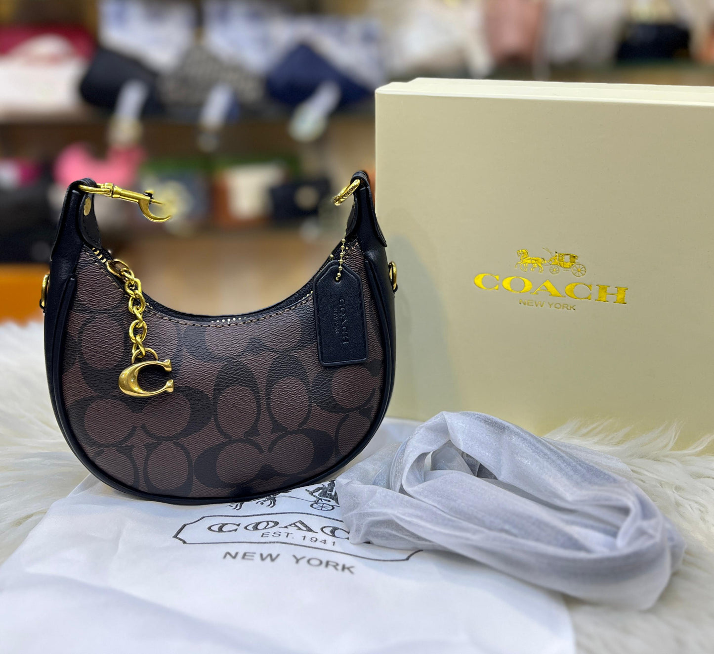 Chic Demi-Lune Mini Shoulder Bag with Gold-Tone Chain and Charm Accent