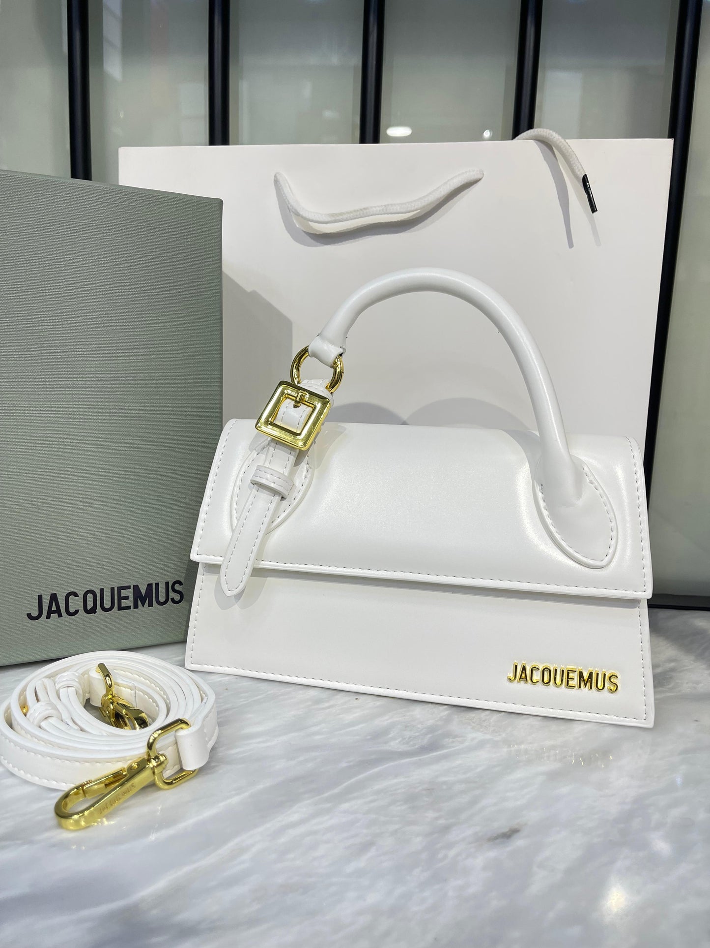 Elegant Sculptural Top-Handle Bag with Gold Hardware