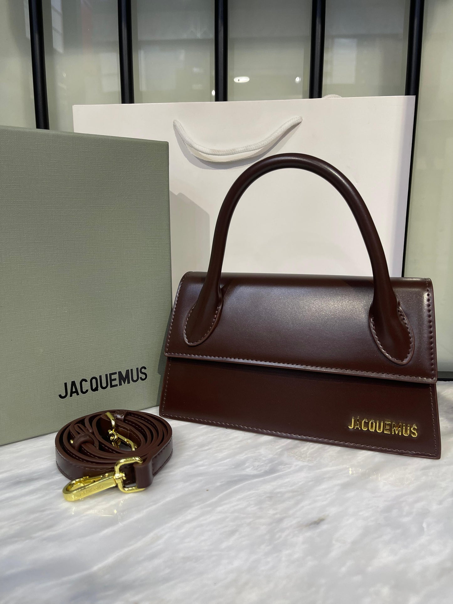 Elegant Sculptural Top-Handle Bag with Gold Hardware