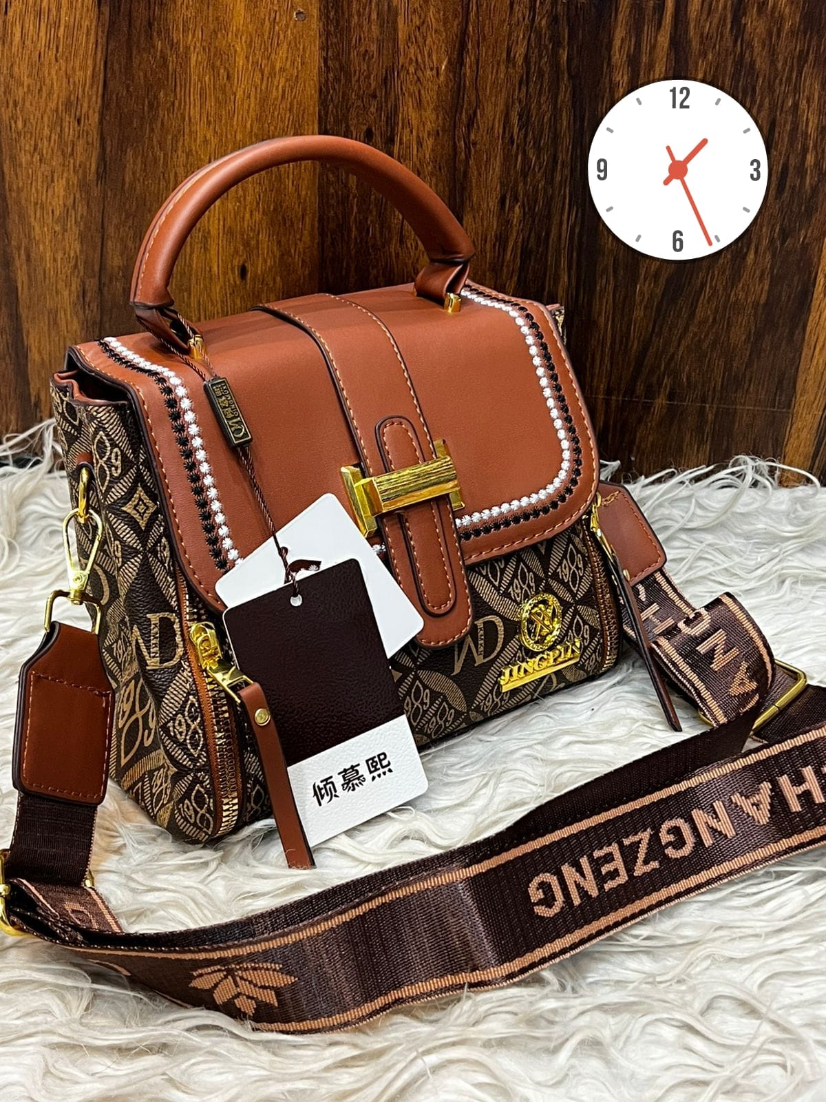 Elegant Two-Tone Structured Satchel with Unique Chain Detail