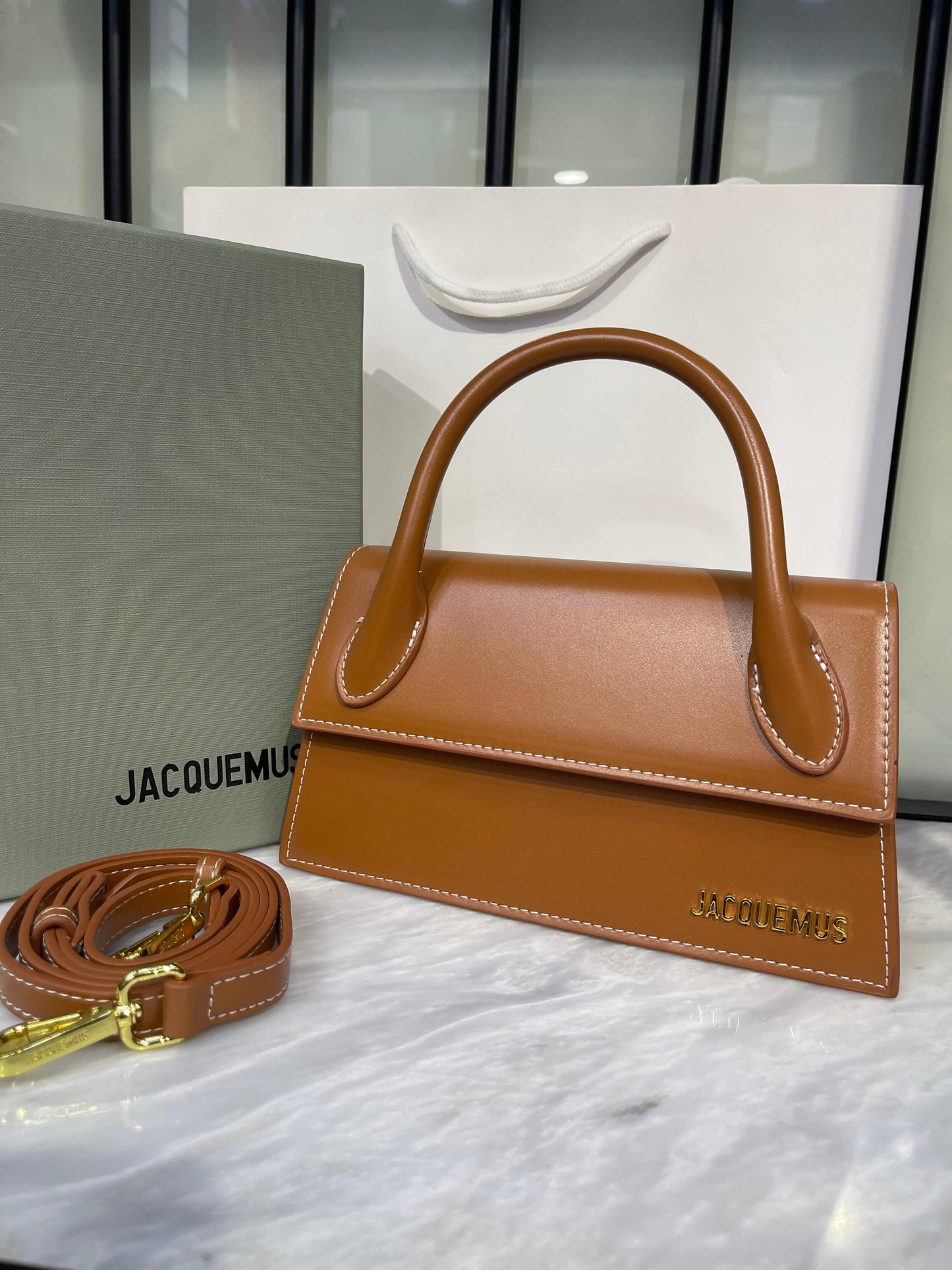 Elegant Sculptural Top-Handle Bag with Gold Hardware